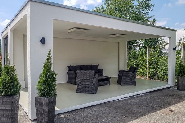 Ein gerendertes Bild, dass eine Terrasse visualisiert, die auf Basis des Grötz Carports errichtet wurde.
